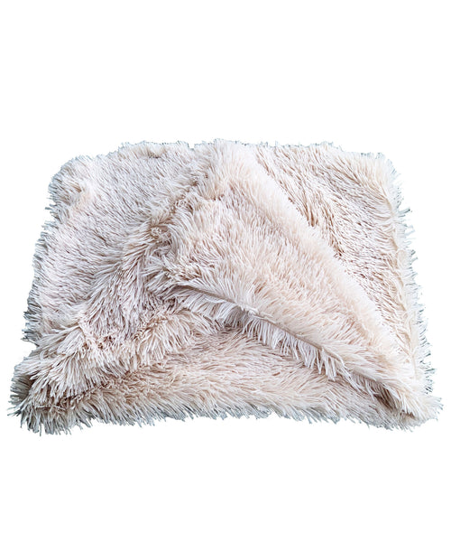 The DenKind Fluffy Blanket in beige, folded